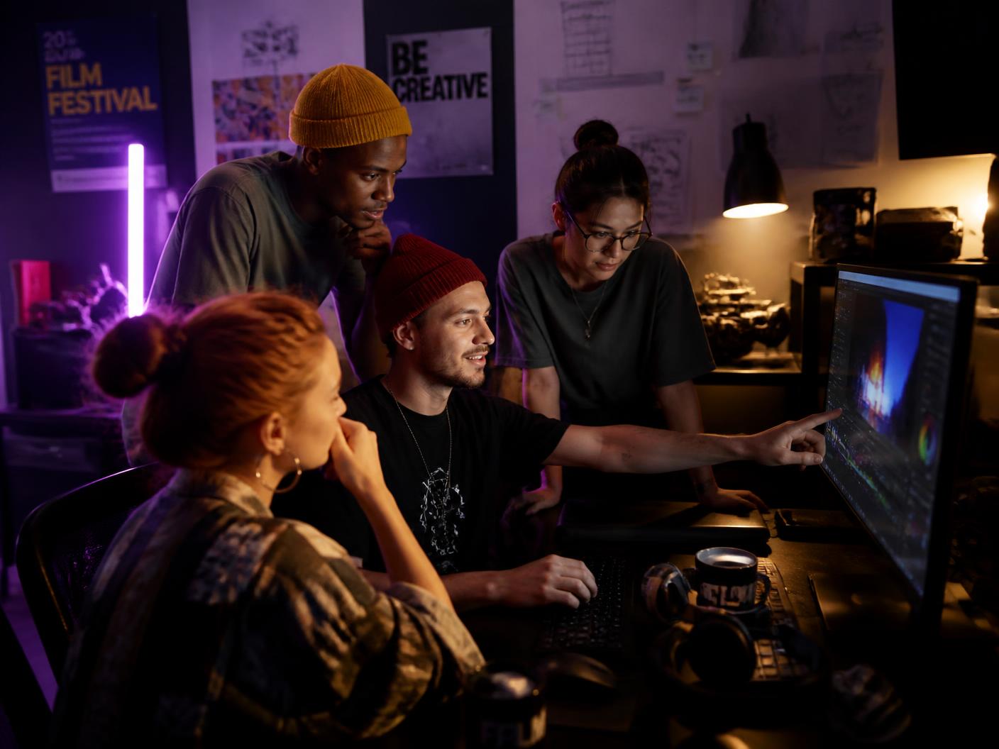 Uburu media — young creators editing in a studio